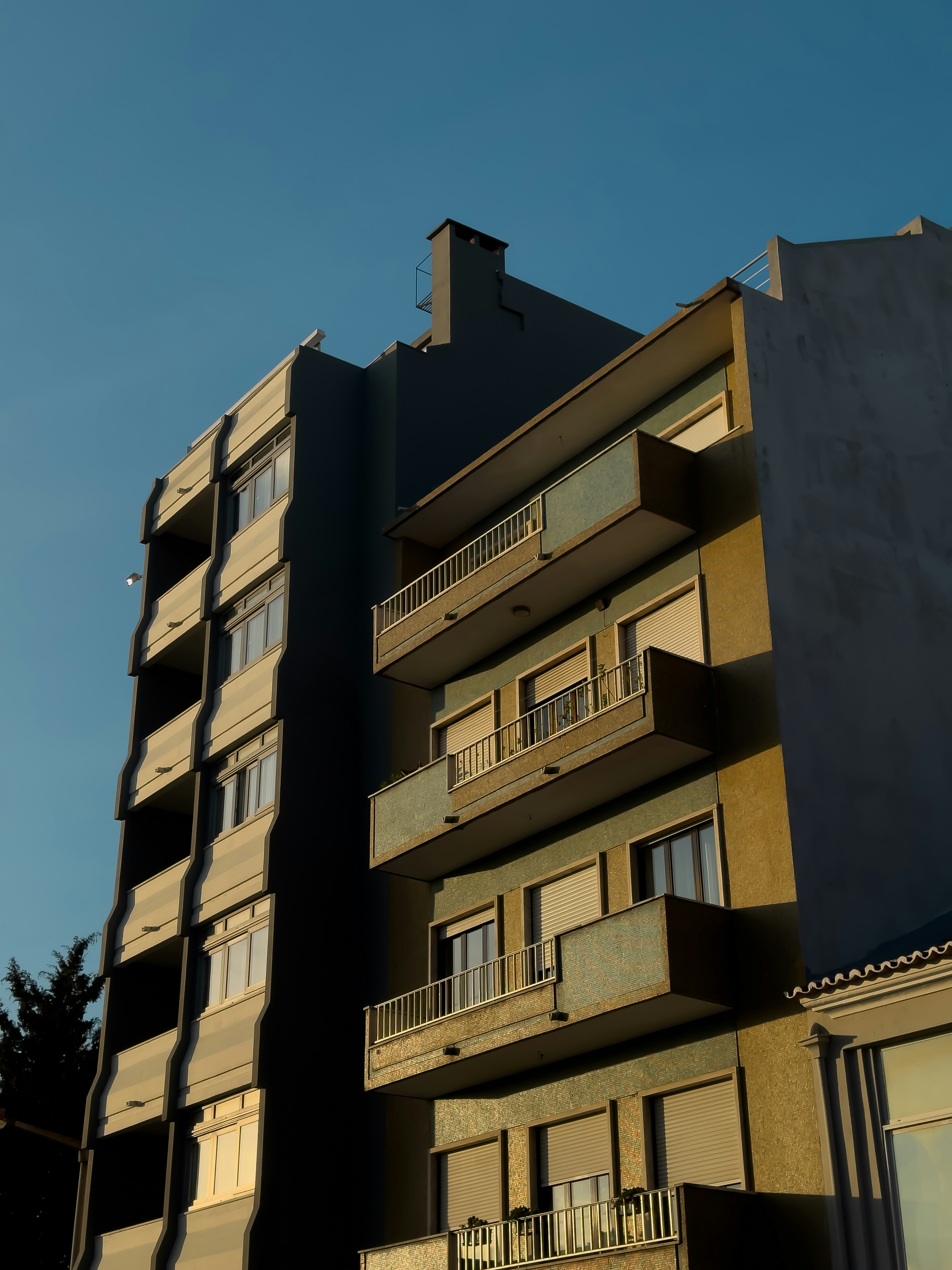 Luxury apartment building facade in warm evening light